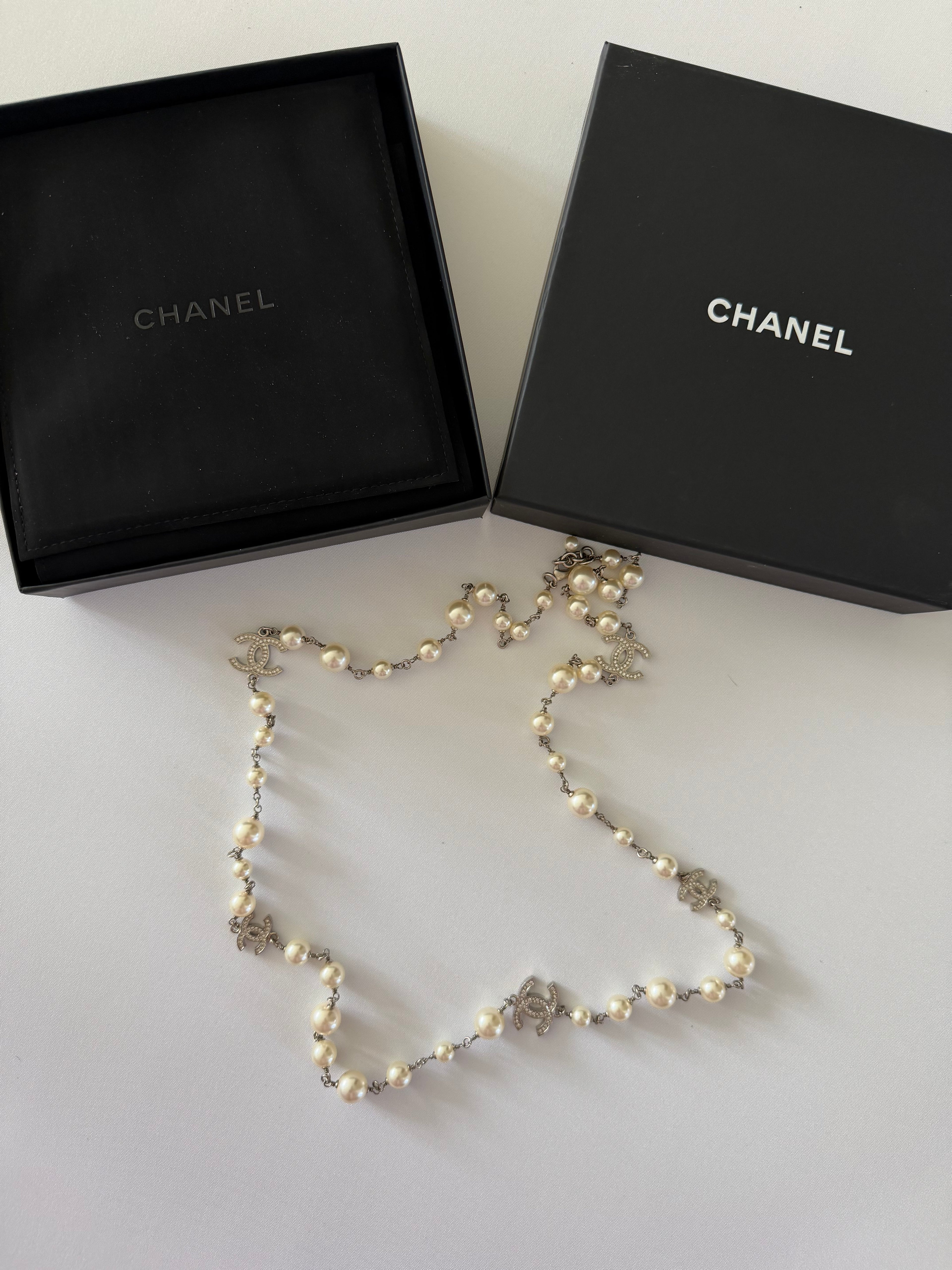Chanel CC Faux Pearl Long Necklace Silver Crystal Logo Station Chain Classic