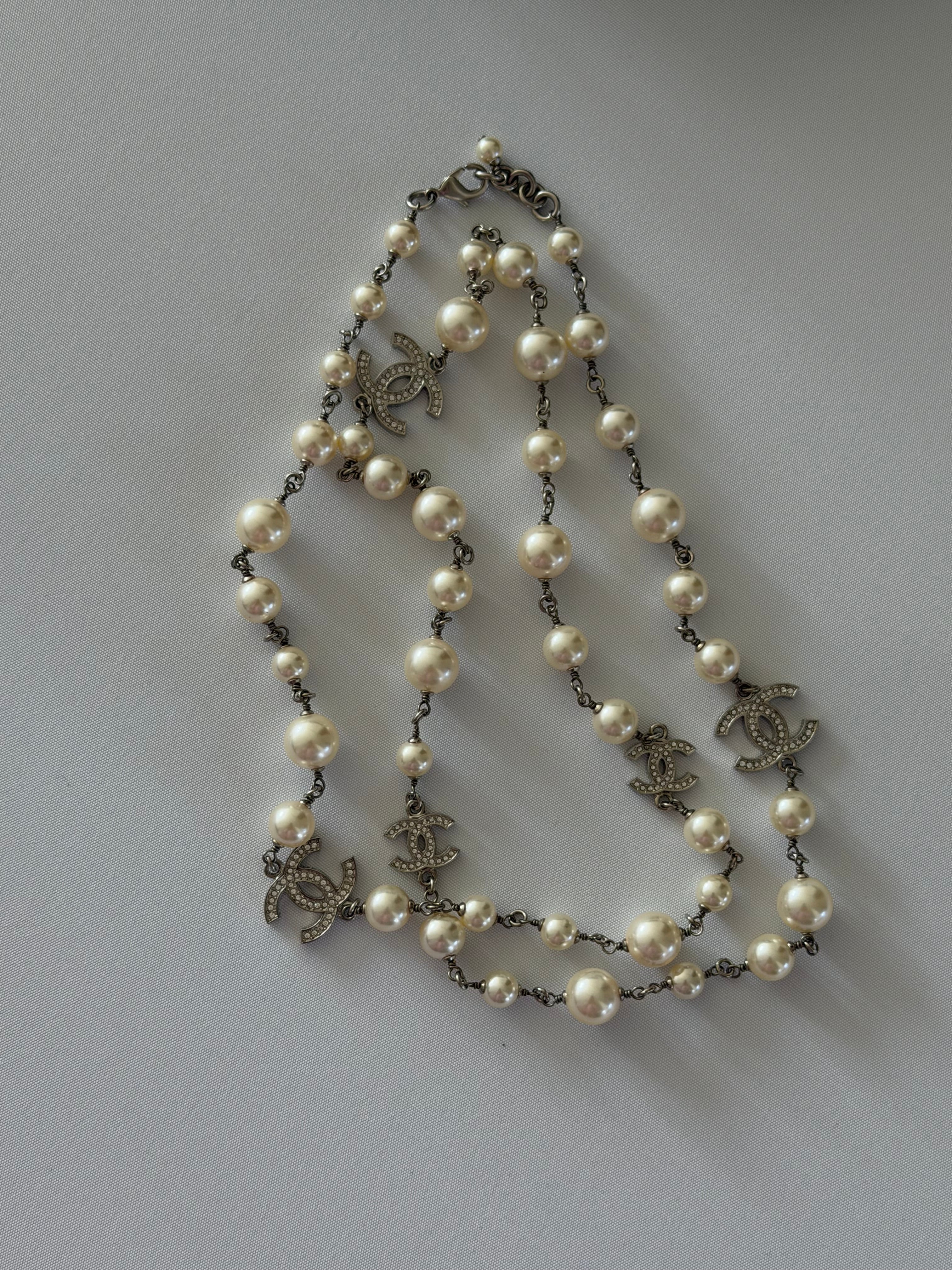 Chanel CC Faux Pearl Long Necklace Silver Crystal Logo Station Chain Classic