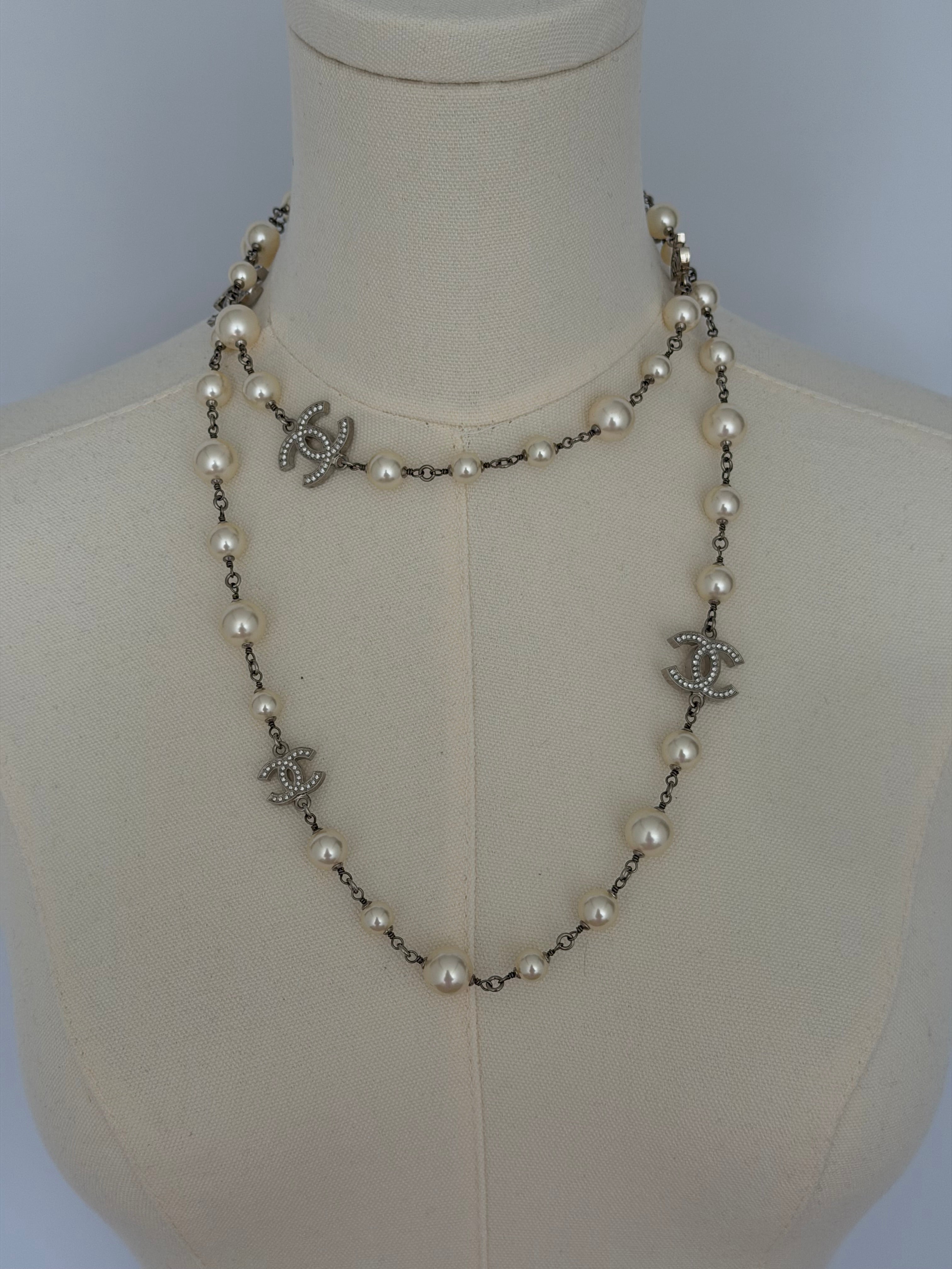 Chanel CC Faux Pearl Long Necklace Silver Crystal Logo Station Chain Classic